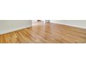 A beautiful hardwood floor is showcased in this room at 8612 Delhi Rd, North Charleston, SC 29406