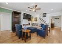 Cozy living room with a fireplace, plush seating, and a view of the staircase at 101 Caleb Ct, Ladson, SC 29456