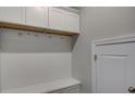 Mud room with built-in storage, coat hooks, and a convenient bench for organization at 1671 Grange Cir, Summerville, SC 29486