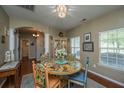 Charming dining room with hardwood floors, decorative table and lots of natural light at 3031 Ellington Dr, Summerville, SC 29485