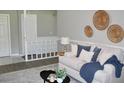Cozy living room with comfortable seating and decor accents, perfect for relaxing and entertaining at 7774 Ginger Ln, North Charleston, SC 29420