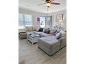 Comfortable living room featuring a large sectional sofa and plenty of natural light at 1207 Saint Johns Ave, Moncks Corner, SC 29461