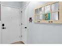 Bright entryway with decorative mirror, coat rack, and view into the home at 1208 Village Creek Ln Ln # 1, Mount Pleasant, SC 29464