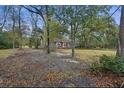 Charming brick home nestled among mature trees at 1263 N Highway 52, Moncks Corner, SC 29461
