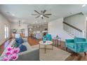 Open living area with hardwood floors, kitchen, dining, and comfortable seating arrangement at 175 Darby Meadow Ln, Ridgeville, SC 29472
