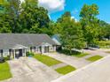 Aerial view of a well-maintained home surrounded by mature trees at 207 Allen Richard Ct # B, Moncks Corner, SC 29461