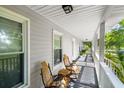 Inviting front porch with comfortable seating, offering a relaxing outdoor space with views of the surrounding neighborhood at 617 Willdrew Ln, Moncks Corner, SC 29461