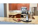 Elegant kitchen with stainless steel appliances, granite countertops, and a stylish snack spread at 115 Hyrne Dr, Goose Creek, SC 29445