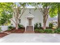 Inviting front entrance with brick steps, a covered porch, and manicured landscaping at 1514 Village Sq, Mount Pleasant, SC 29464