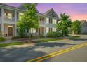 Beautiful exterior view of a townhome with sidewalk and yellow lines at 1876 Towne St, Johns Island, SC 29455