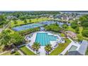 Aerial shot showcasing the community pool, tennis courts, playground, and surrounding neighborhood at 2269 Hartfords Bluff Cir, Mount Pleasant, SC 29466