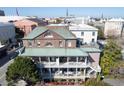 Stunning exterior featuring double stacked porches offering plenty of room for sitting and relaxing at 286 Meeting St # C, Charleston, SC 29407