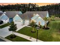Aerial view showcasing the property's well-manicured lawn, driveway, and landscaping features at 467 Hidden Meadow Ln, Summerville, SC 29486