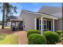 The side of this house features a screened-in porch perfect for relaxing outdoors at 4801 Shady Tree Ln, Summerville, SC 29485