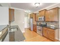 View of kitchen with stainless steel appliances and granite countertops at 4936 Ballantine Dr, Summerville, SC 29485