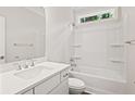 Bright bathroom featuring a tub with shower, vanity with hard surface countertop, and natural light at 5182 Stono Plantation Rd Dr, Hollywood, SC 29449