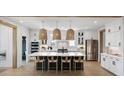 Spacious kitchen with a large center island, stainless steel appliances and stylish pendant lighting at 148 Falaise St, Charleston, SC 29492