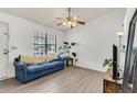 Cozy living room with comfortable seating, natural light, and modern flooring, ideal for relaxing at home at 202 Pamela Ln, Summerville, SC 29483