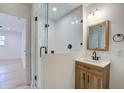 Beautiful bathroom featuring a glass enclosed shower, vanity and wood accents at 2135 Clayton St, Charleston, SC 29414