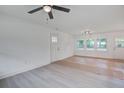 Open concept living room with modern floors, fixtures, and ample natural light at 2135 Clayton St, Charleston, SC 29414
