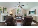 Bright living room with vaulted ceiling, fireplace, ceiling fan, and ample natural light at 332 Clayton Dr, Charleston, SC 29414