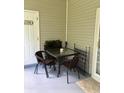 Cozy patio area with outdoor seating, perfect for relaxing and enjoying the outdoors at 123 Lynches River Dr, Summerville, SC 29485