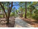Secluded home on wooded lot accessed by a long private driveway at 3052 Seabrook Island Rd, Seabrook Island, SC 29455