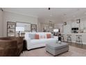 Bright and airy living room featuring modern furniture, neutral color palette, and stylish decor at 324 Trailmore Ln, Summerville, SC 29486
