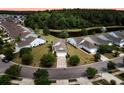 Aerial shot of a home in a residential neighborhood with mature trees and landscaping at 528 Sea Foam St, Summerville, SC 29486