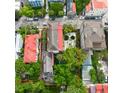Aerial view showcasing the property's boundaries, mature landscaping and street access at 81 Rutledge Ave, Charleston, SC 29401