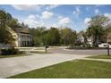 Beautiful residential neighborhood with well-maintained homes and lush green landscaping along a circular street at 136 Stagecoach Ln, Summerville, SC 29483