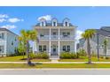 Charming two-story home with a double porch and lush landscaping at 1828 Agate Bay Dr, Mount Pleasant, SC 29466