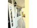 Covered entryway with a glass-paneled door, Ring Doorbell, and sleek black hardware at 332 Southern Sugar Ave, Moncks Corner, SC 29461