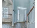 Bright foyer with hardwood floors, a staircase, and ample natural light at 575 Rosings Dr, Summerville, SC 29486