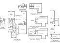 Detailed floor plan showcasing the layout of the home, including bedrooms, kitchen, and garage at 6105 Sourwood Trl, Ridgeville, SC 29472