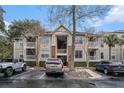 Exterior of complex shows multiple units with central entrance and parking at 1600 Long Grove Dr # 1512, Mount Pleasant, SC 29464