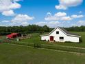 Beautiful barn with a fence in a rural estate at 2470 Breakaway Trl, Johns Island, SC 29455