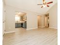 Bright living area featuring open floor plan, neutral walls, and view of the kitchen at 258 Trickle Dr, Summerville, SC 29483