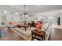 Comfortable living area with natural light, stylish furnishings, and an open connection to the modern kitchen at 2772 Latrobe Ct, Mount Pleasant, SC 29466
