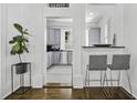 Kitchen area with light-gray cabinets, a black countertop, and stainless steel appliances at 33 Pitt St # 3, Charleston, SC 29401