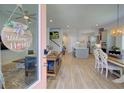 Open-concept home with a view from the entry, showcasing the living area, kitchen, and dining space at 3539 Habenaria Rd # 28, Mount Pleasant, SC 29466