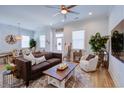 Bright living room with stylish decor, including a comfortable sofa, accent chair, and wooden coffee table at 3539 Habenaria Rd # 28, Mount Pleasant, SC 29466