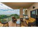 Relax on the expansive balcony with luxurious seating and stunning ocean views at 4209 Ocean Club Dr, Isle of Palms, SC 29451