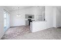 Kitchen and dining area with updated gray cabinets and easy access to the back patio at 5042 Thornton Dr, Summerville, SC 29485