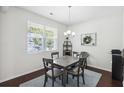 Cozy dining area with large window, modern table set and elegant decor at 9088 Parlor Dr, Ladson, SC 29456