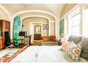 Sunlit bedroom features a cozy sitting area, modern decor, and ample natural light at 12 Bee St # C, Charleston, SC 29403