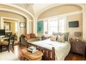Bright bedroom with a comfortable bed, sitting area, and modern furnishings at 12 Bee St # C, Charleston, SC 29403