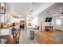 Bright, open kitchen with white cabinets, butcher block countertops, and stainless steel appliances at 2515 Violet Ave, North Charleston, SC 29405