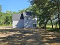 Large backyard of new home with slider access to the yard at 6343 N Hwy 17, Awendaw, SC 29429