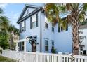 Inviting blue home with well-manicured landscaping and a charming entrance, creating a warm and welcoming ambiance at 8604 Bowen Corner Ave, Hanahan, SC 29410